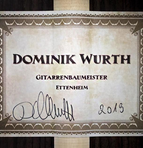 The label of a 2019 Dominik Wurth classical guitar made of cedar and Indian rosewood