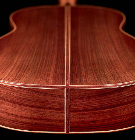 The back and sides of a 2022 Dominik Wurth classical guitar made with cedar and Indian rosewood