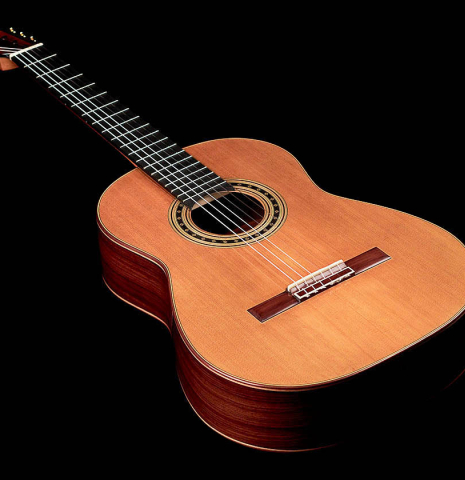The front of a 2022 Dominik Wurth classical guitar made with cedar and Indian rosewood