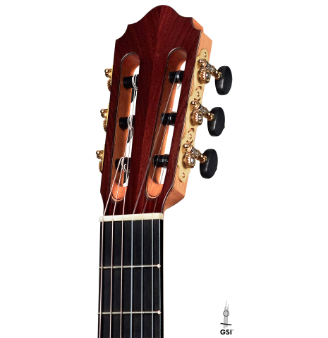 The headstock and machine heads of a 2022 Dominik Wurth classical guitar made with cedar and Indian rosewood