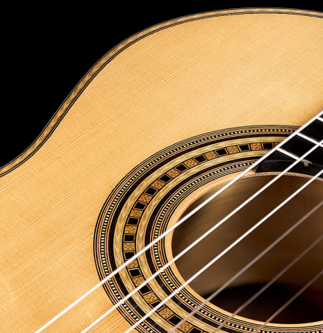The soundboard, rosette and tornavoz of a 2022 Dominik Wurth "Torres" classical guitar model SP/IN