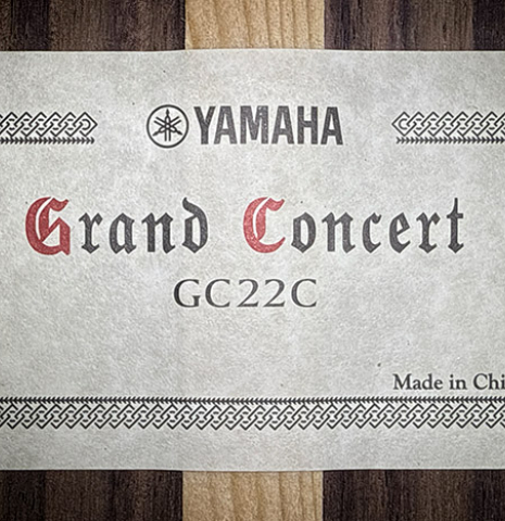 The label of a 2025 Yamaha "Grand Concert GC22" classical guitar made of cedar and Indian rosewood