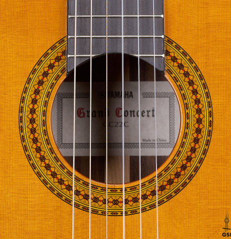 The rosette of a 2025 Yamaha "Grand Concert GC22" classical guitar made of cedar and Indian rosewood