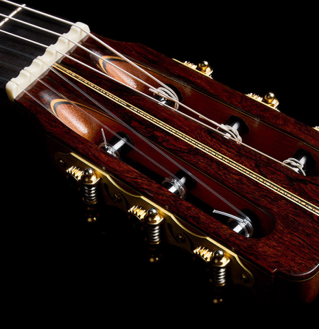 The headstock and tuning machines of a 2026 Fructuoso Zalapa "Romanillos" classical guitar made of spruce and cocobolo