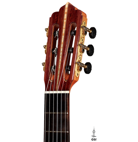 The headstock of a 2022 Fructuoso Zalapa "Romanillos" classical guitar made of spruce and maple