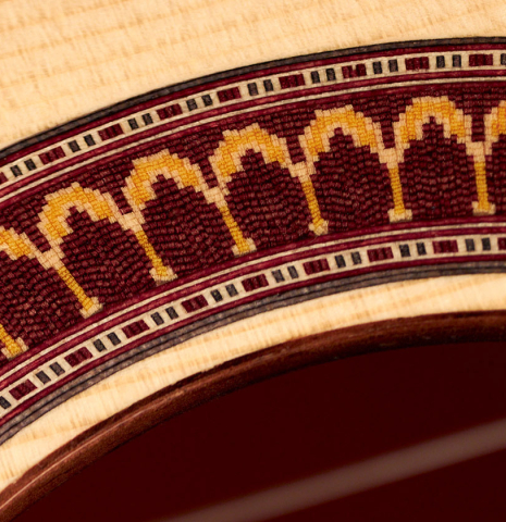 The rosette of a 2022 Fructuoso Zalapa "Romanillos" classical guitar made of spruce and maple