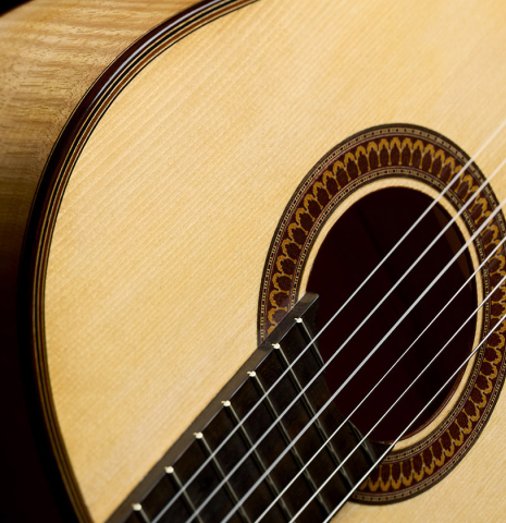 The soundboard and fingerboard of a 2025 Fructuoso Zalapa "Romanillos" classical guitar made of spruce and maple