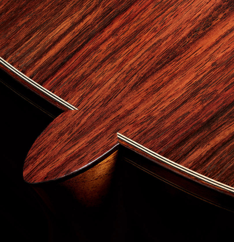The heel, back binding and purfling of a 2024 Silvia Zanchi classical guitar made of spruce and Indian rosewood