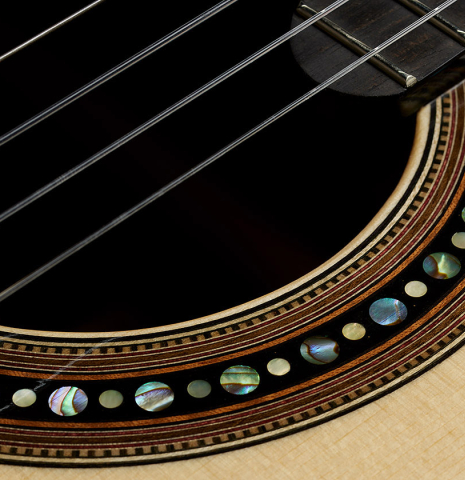 The top and close-up detail of the rosette of a 2024 Silvia Zanchi classical guitar made of spruce and Indian rosewood