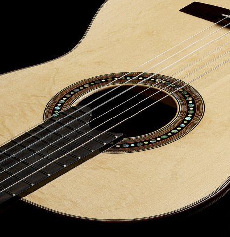 The soundboard of a 2024 Silvia Zanchi classical guitar made of spruce and Indian rosewood