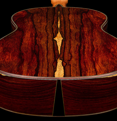 The back and sides at the foot of a 2025 Antonio Zwirn classical guitar made of spruce and cocobolo