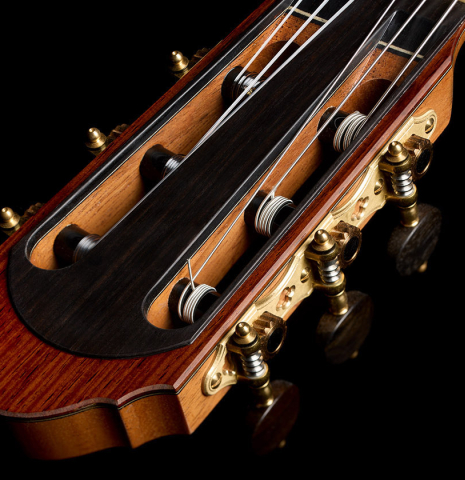 The tuning machines and headstock veneer of a 2025 Antonio Zwirn classical guitar made of spruce and cocobolo