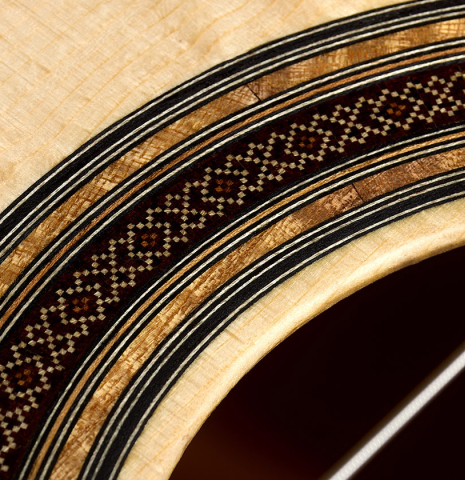 The top and rosette detail of a 2025 Antonio Zwirn classical guitar made of spruce and cocobolo