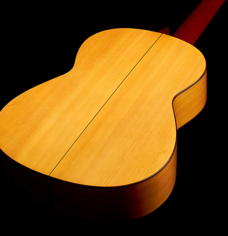 The back of a 2012 Marlon Navarro Alvarez Student Flamenco guitar made of spruce and cypress