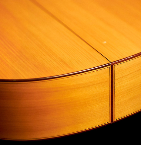 The back and sides of a 2012 Marlon Navarro Alvarez Student Flamenco guitar made of spruce and cypress