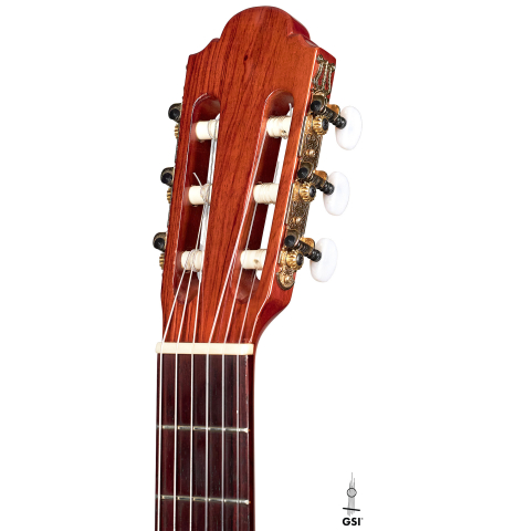 The headstock and machine heads of a 2012 Marlon Navarro Alvarez Student Flamenco guitar made of spruce and cypress