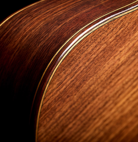The back and side of a 2025 Manuel Arango "Negra" flamenco guitar made of spruce and Indian rosewood