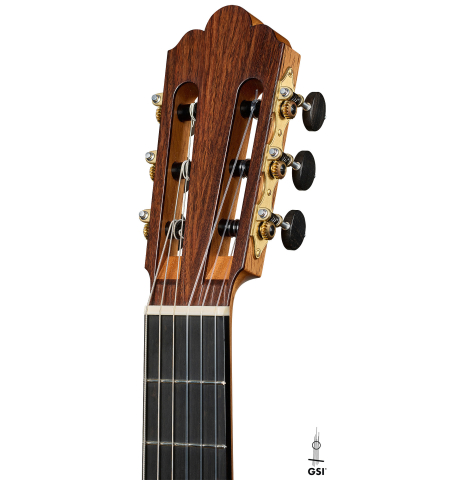The headstock of a 2025 Manuel Arango "Negra" flamenco guitar made of spruce and Indian rosewood
