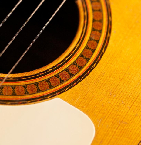 The rosette and tap plate of a 1950 Marcelo Barbero (ex Manolo Sanlucar) flamenco guitar made of spruce and cypress