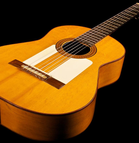 The front of a 1950 Marcelo Barbero (ex Manolo Sanlucar) flamenco guitar made of spruce and cypress