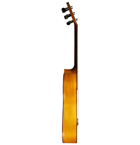 The side of a 1950 Marcelo Barbero (ex Manolo Sanlucar) flamenco guitar made of spruce and cypress