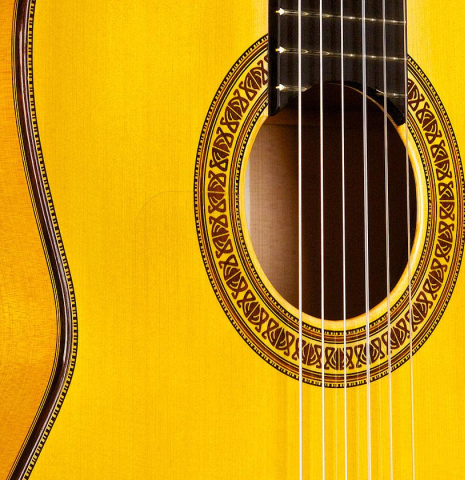 The soundboard of a 2015 Francisco Barba flamenco guitar made with spruce and cypress