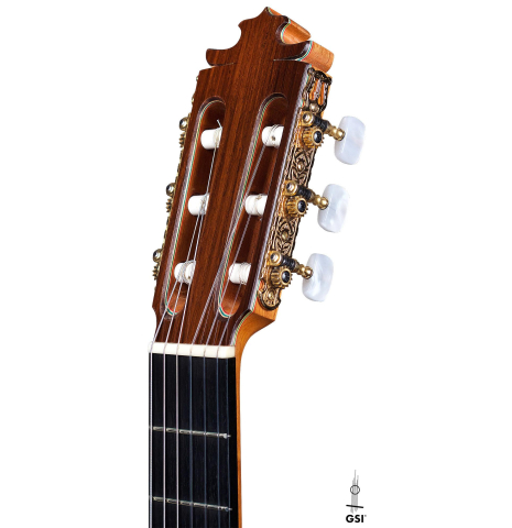 The headstock of a 2007 Francisco Barba flamenco guitar made of spruce and cypress