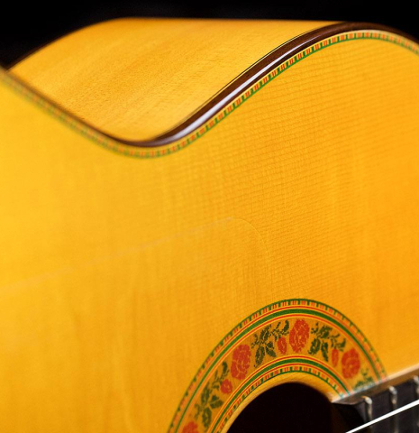 The soundboard of a 2007 Francisco Barba flamenco guitar made of spruce and cypress