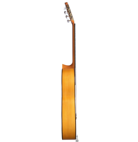 The side of a 2007 Francisco Barba flamenco guitar made of spruce and cypress