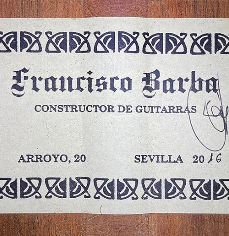 The label of a 2016 Francisco Barba CD/MH Flamenco guitar made with cedar top and mahogany back and sides