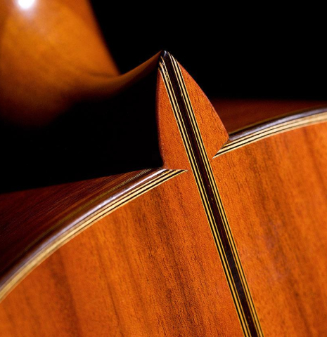 The back at the heel of a 2016 Francisco Barba CD/MH Flamenco guitar made with cedar top and mahogany back and sides