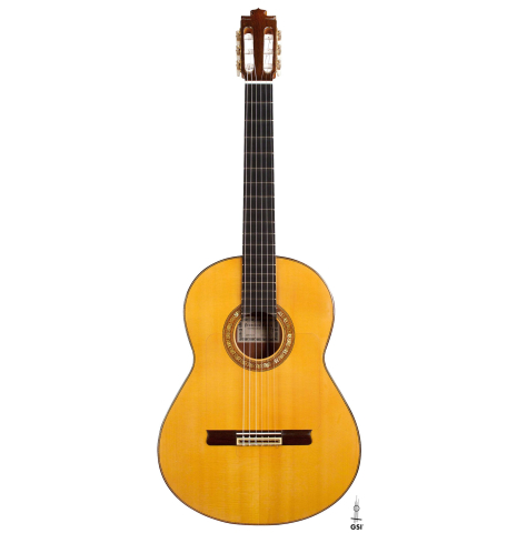 The front of a 2016 Francisco Barba CD/MH Flamenco guitar made with cedar top and mahogany back and sides on a white background