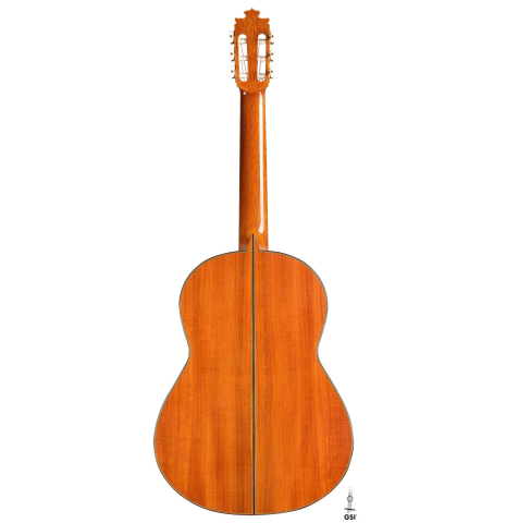 The back of a 2016 Francisco Barba CD/MH Flamenco guitar made with cedar top and mahogany back and sides on a white background