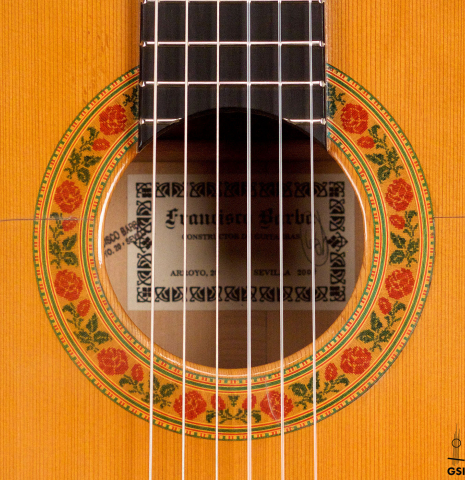 The rosette of a 2007 Francisco Barba flamenco guitar made with cedar and cypress