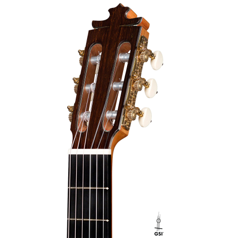 The headstock of a 2022 Francisco Barba flamenco guitar made of cedar and cypress