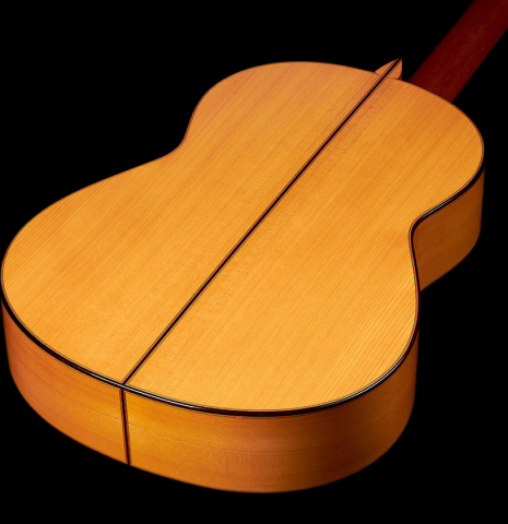 The back of a 2015 Francisco Barba flamenco blanca guitar made of spruce and cypress.