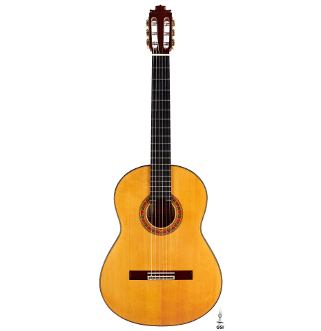 The front of a 2015 Francisco Barba flamenco blanca guitar made of spruce and cypress.