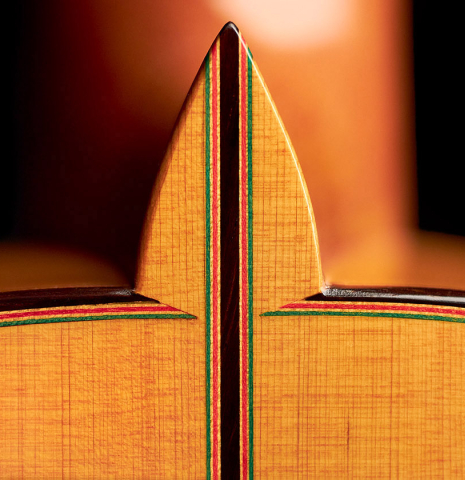 The heel of a 2015 Francisco Barba flamenco blanca guitar made of spruce and cypress.