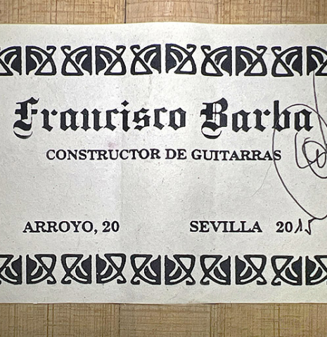 The label of a 2015 Francisco Barba flamenco blanca guitar made of spruce and cypress.
