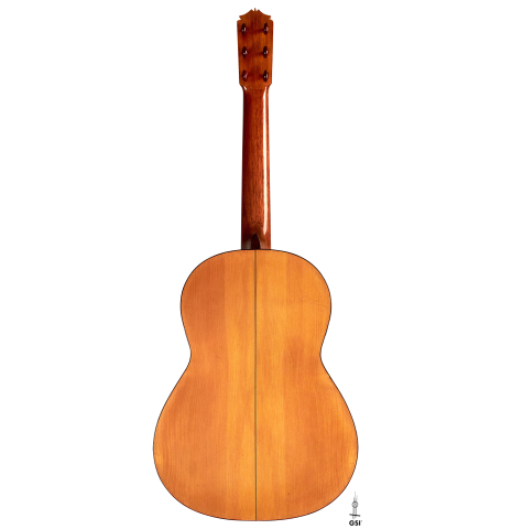 The back of a 1950 Marcelo Barbero flamenco guitar with traditional pegs made of spruce and cypress