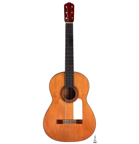 The front of a 1950 Marcelo Barbero flamenco guitar with traditional pegs made of spruce and cypress
