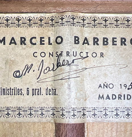 The label of a 1950 Marcelo Barbero flamenco guitar with traditional pegs made of spruce and cypress
