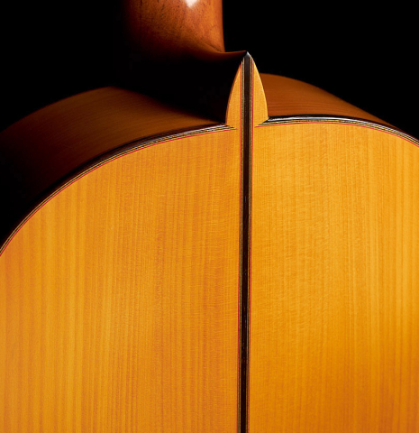 The back, heel and center seam of a 1987 Francisco Barba flamenco guitar made of spruce and cypress