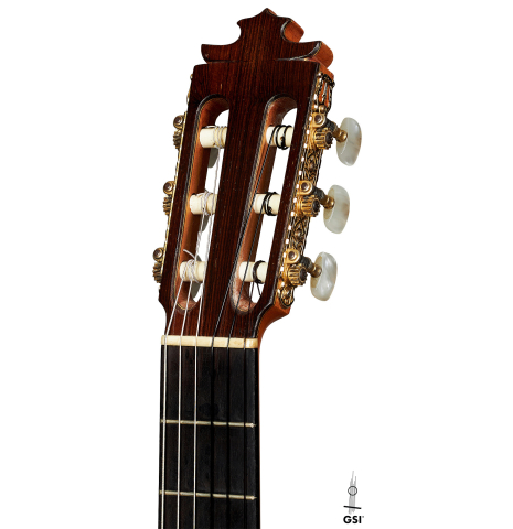 The headstock of a 1987 Francisco Barba flamenco guitar made of spruce and cypress