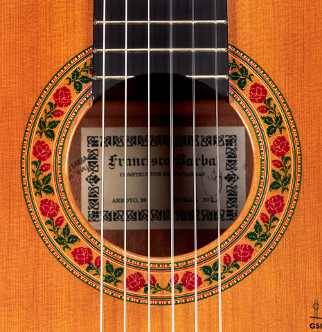 The rosette of a 2021 Francisco Barba CD/MH Flamenco guitar made with cedar top and mahogany back and sides