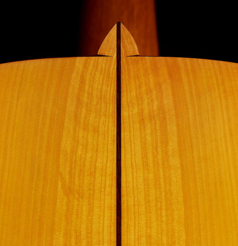 The back center seam and heel of a 2003 Francisco Barba flamenco guitar made of spruce and cypress
