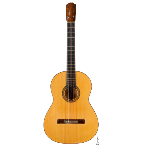 The front of a 1952 Marcelo Barbero flamenco blanca guitar w/pegs made of spruce and cypress