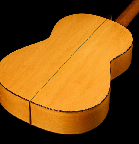 The back and sides of a 1952 Marcelo Barbero flamenco blanca guitar w/pegs made of spruce and cypress