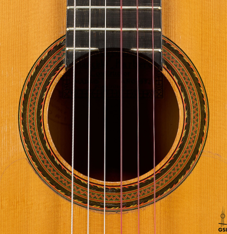 The rosette of a 1952 Marcelo Barbero flamenco blanca guitar w/pegs made of spruce and cypress