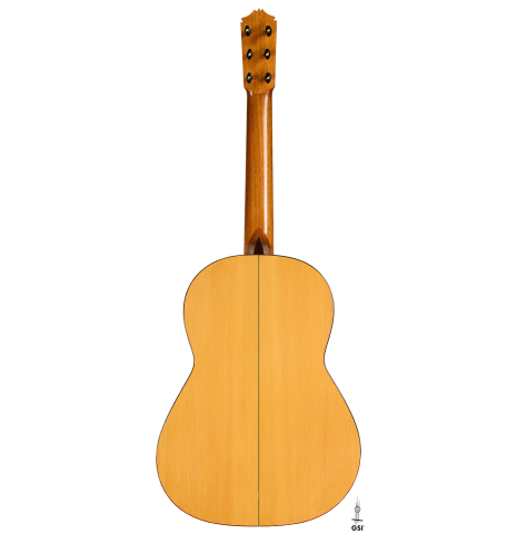 The back of a 1952 Marcelo Barbero flamenco blanca guitar w/pegs made of spruce and cypress